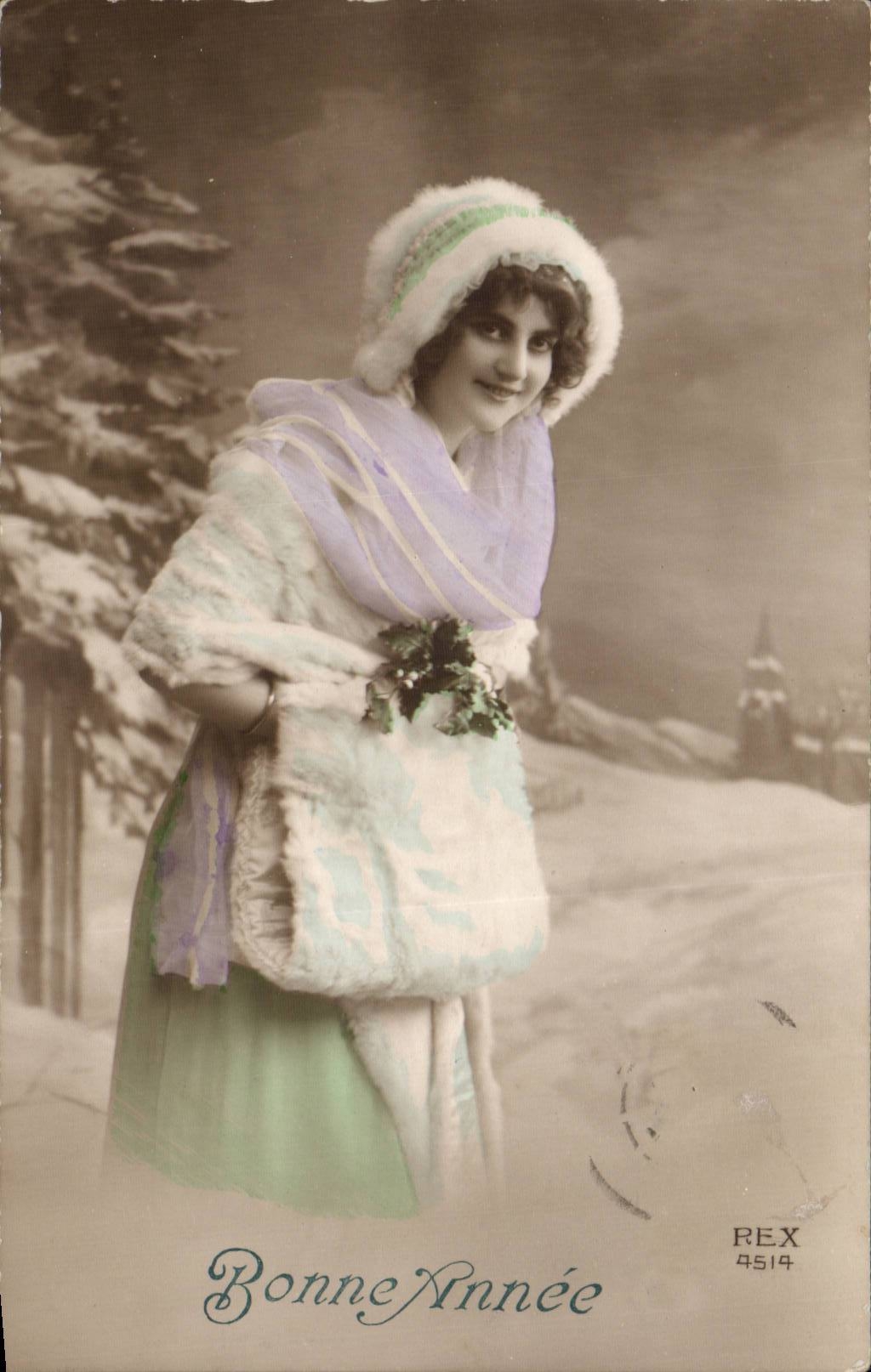 Femme en tenue d'hiver — paysage neigeux — REX 4514