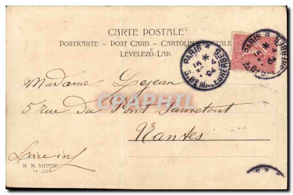 Femme élégante au chapeau — éditeur M.M. Vienne, n° 112 — Reverso