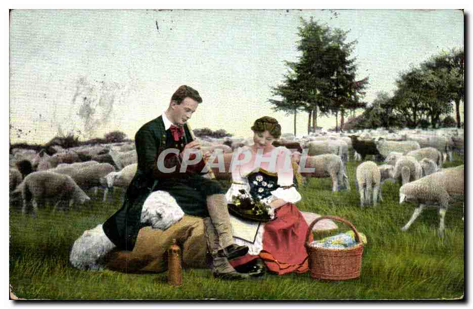 Couple en pique-nique au milieu d'un troupeau de moutons — éditeur : Weltpostverein, série 308