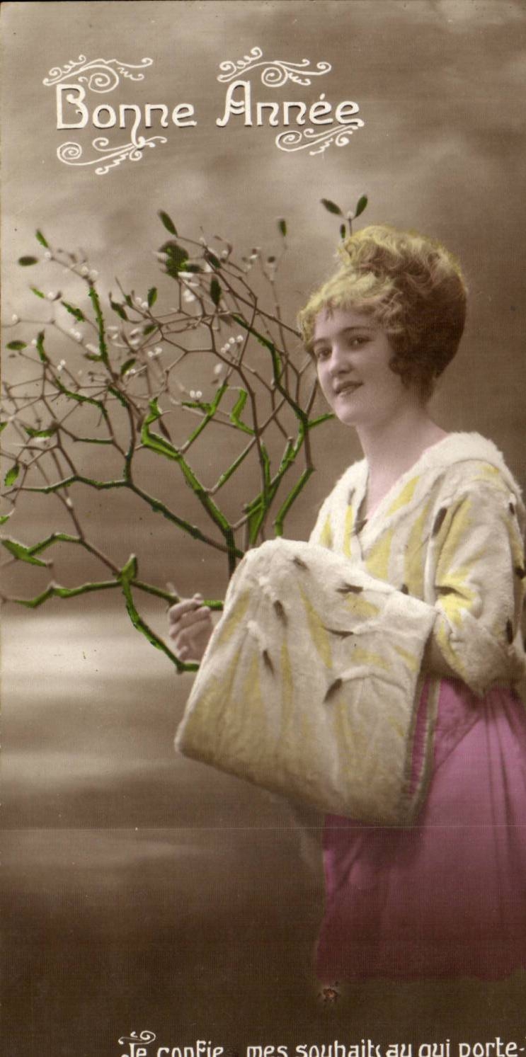 Je confie mes souhaits au qui porte — Bonne Année — jeune femme tenant un bouquet de gui