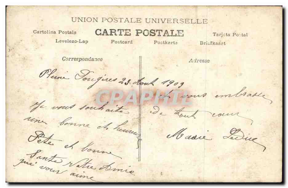Femme en robe bleue tenant un bouquet — Pour Pétér St Louis — An Paris, n° 934 — Reverso