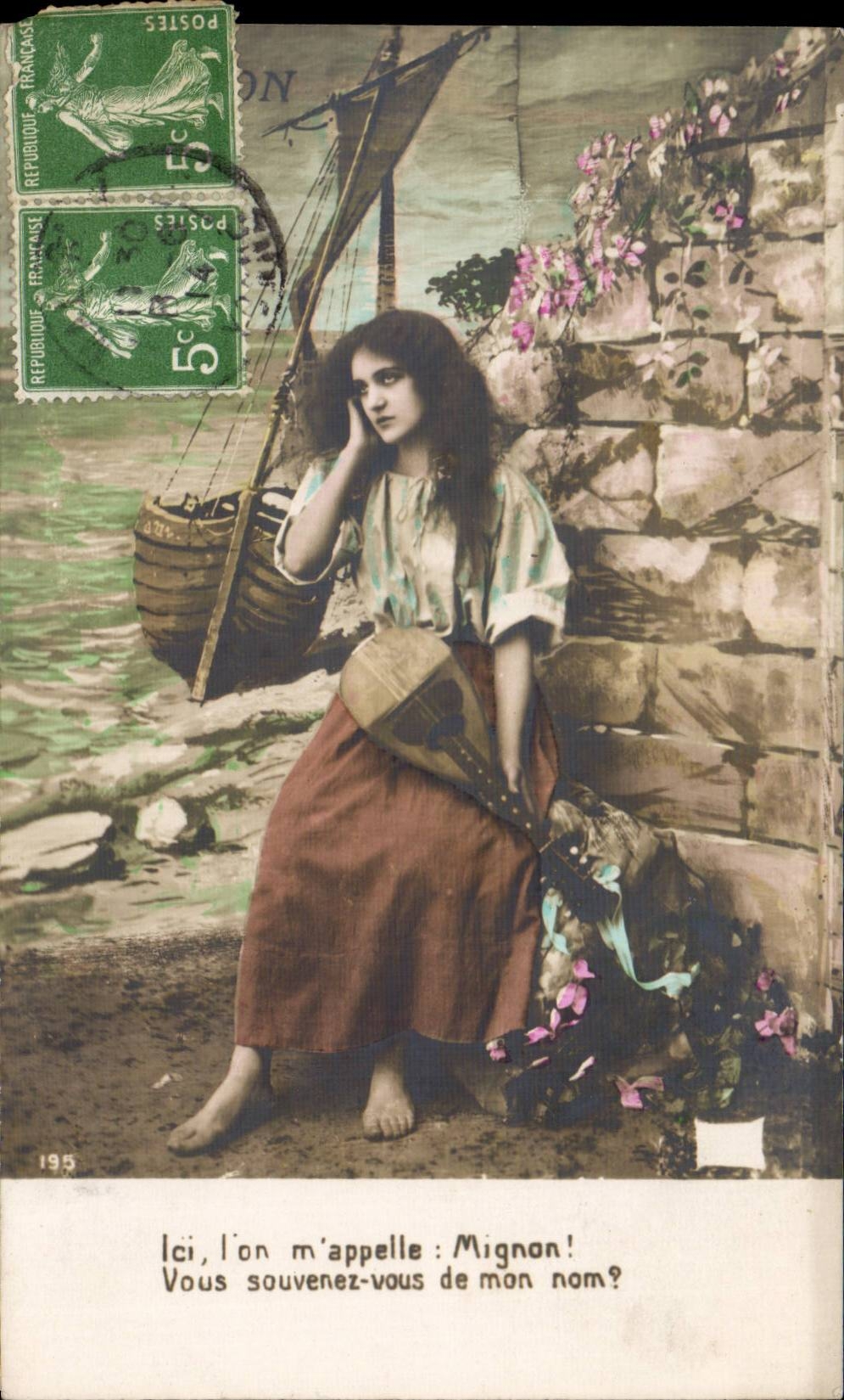 Woman sitting near a stone wall — harbor scene — publisher not visible