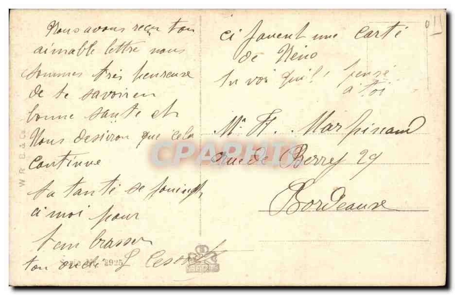 Jeune femme souriante lisant — carte postale colorisée — éditeur WRECKS, n° 011 — Verso