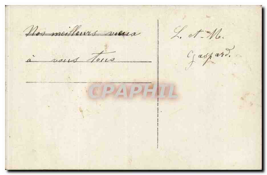 Femme en robe lilas tenant des cadeaux — 'Heureuse Année' — K.L. n°502 — Verso