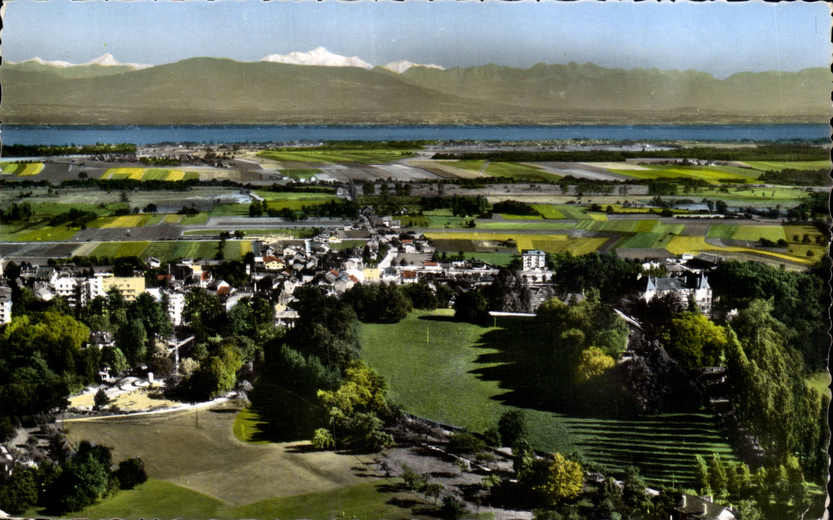 Divonne-les-Bains (Ain) — Aerial view of the town; in the background, the Mont Blanc — Edition J. Cellard