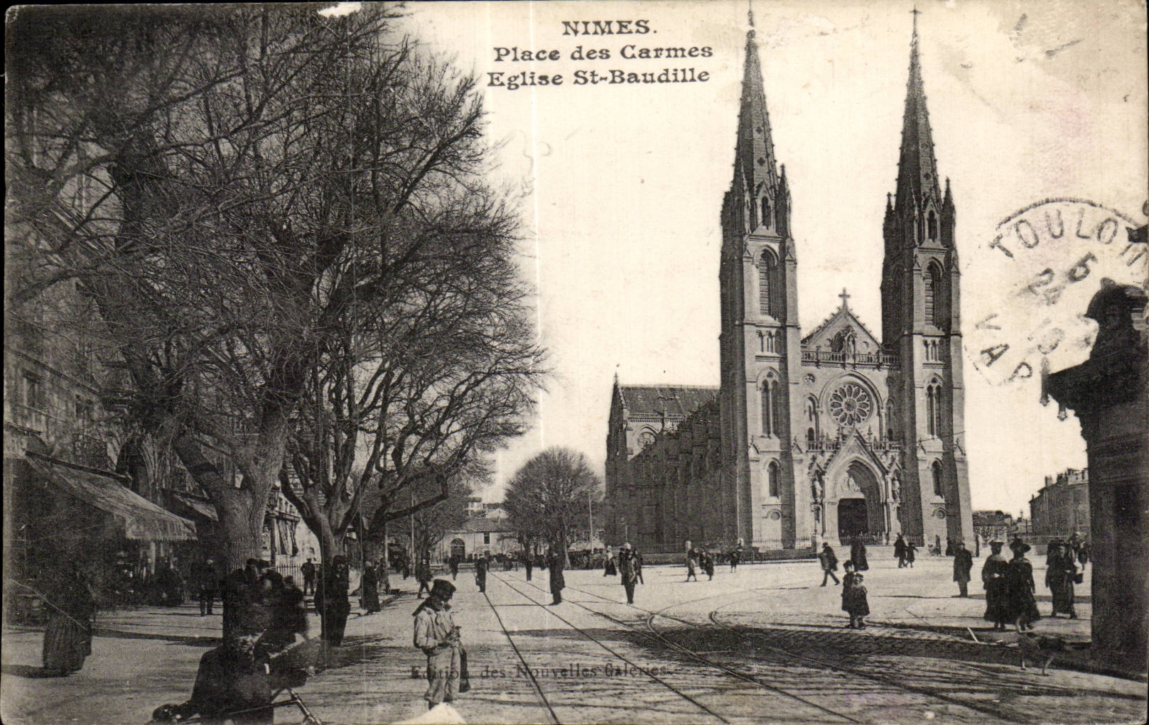 Nîmes. Place des Carmes — Église Saint-Baudille — Éditeur : Des Nouvelles Galeries