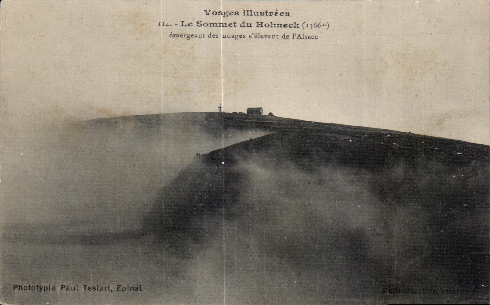 Der Gipfel des Hohneck (1366m) — aus den Wolken emerget, die über der Elsass aufsteigen — Phototypie Paul Testart, Epinal, n°114