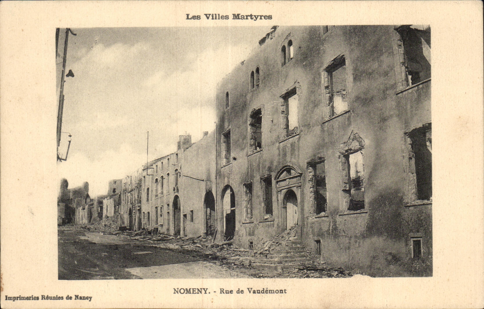 Nomeny - Rue de Vaudémont — Ruines après guerre — Imprimeries Réunies de Naney