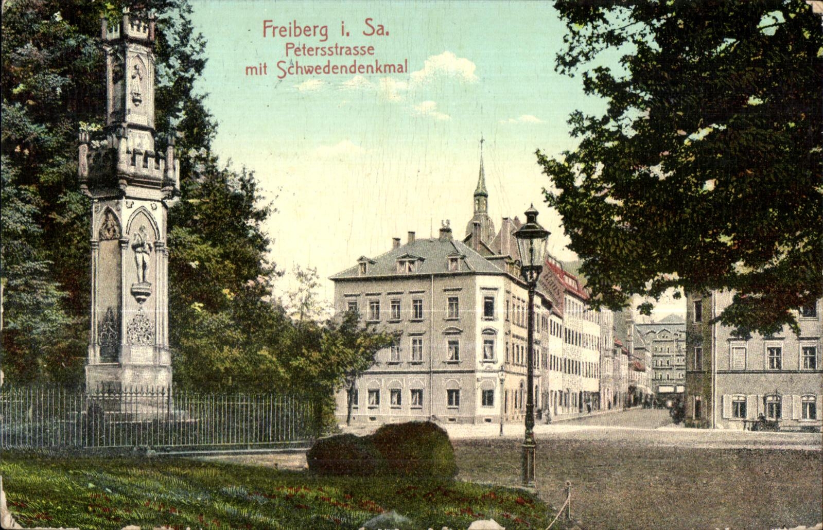 CPA Freiberg i Sa Petersstrasse mit Schwedendenkmal
