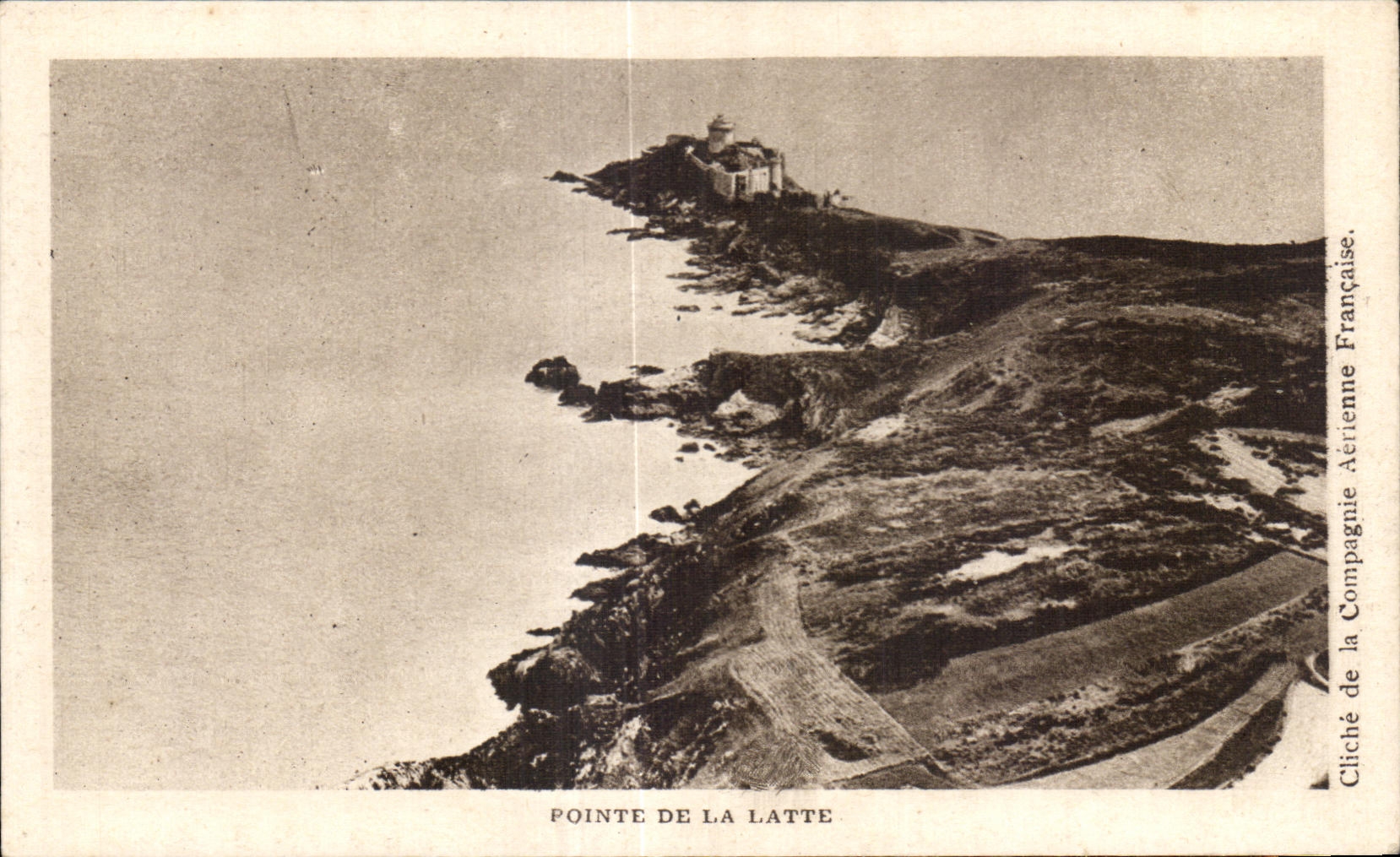 Pointe de La Latte — view of the lighthouse on the coast — Cliché de la Compagnie Aérienne Française