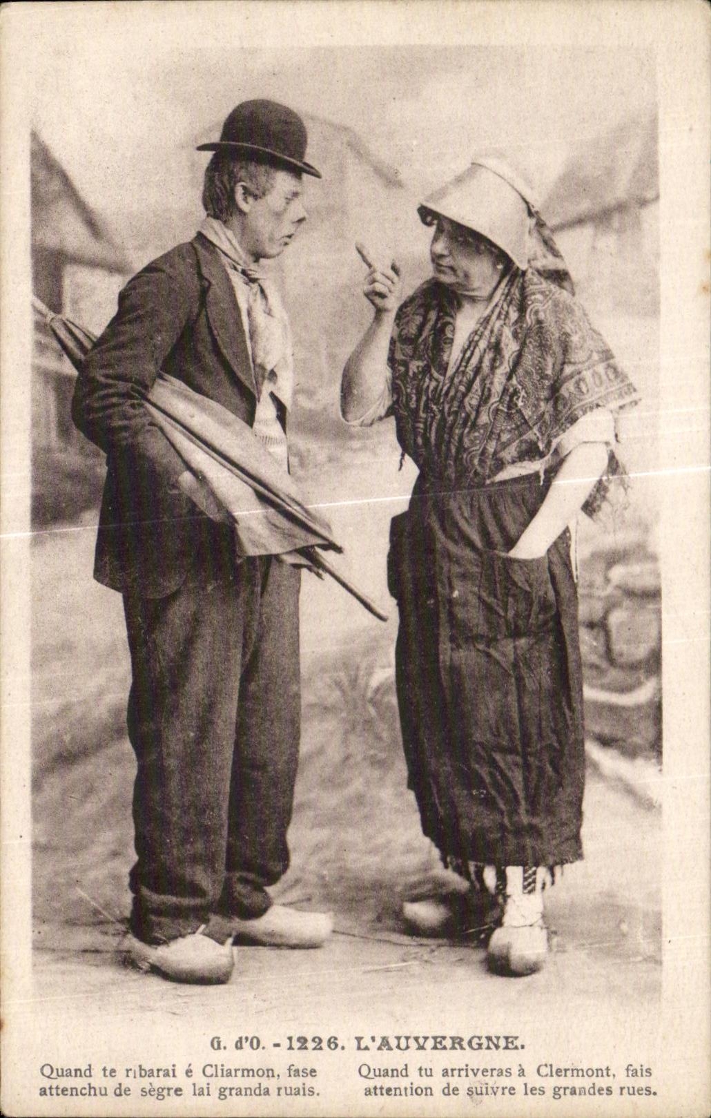 Homme et femme en tenue locale — L'Auvergne — G. d'O. - 1226