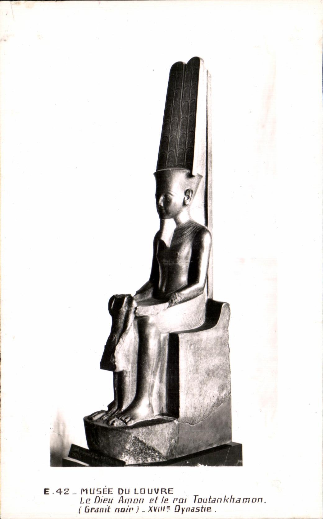 Le Dieu Amon et le roi Toutankhamon — Granit noir — XVIIIe Dynastie — Musée du Louvre — E.42