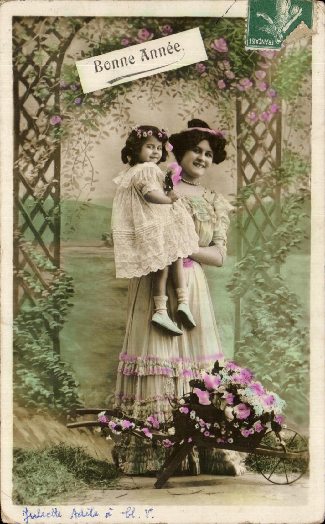 Femme et enfant dans un jardin — 'Bonne Année' — Jardicette Achille à -Bl. V.