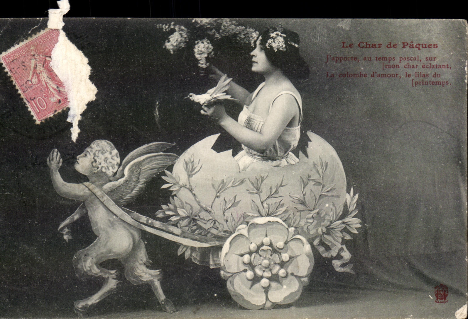 Char de Pâques — femme dans un char décoré de fleurs, accompagnée d'un petit ange — éditeur VANDER