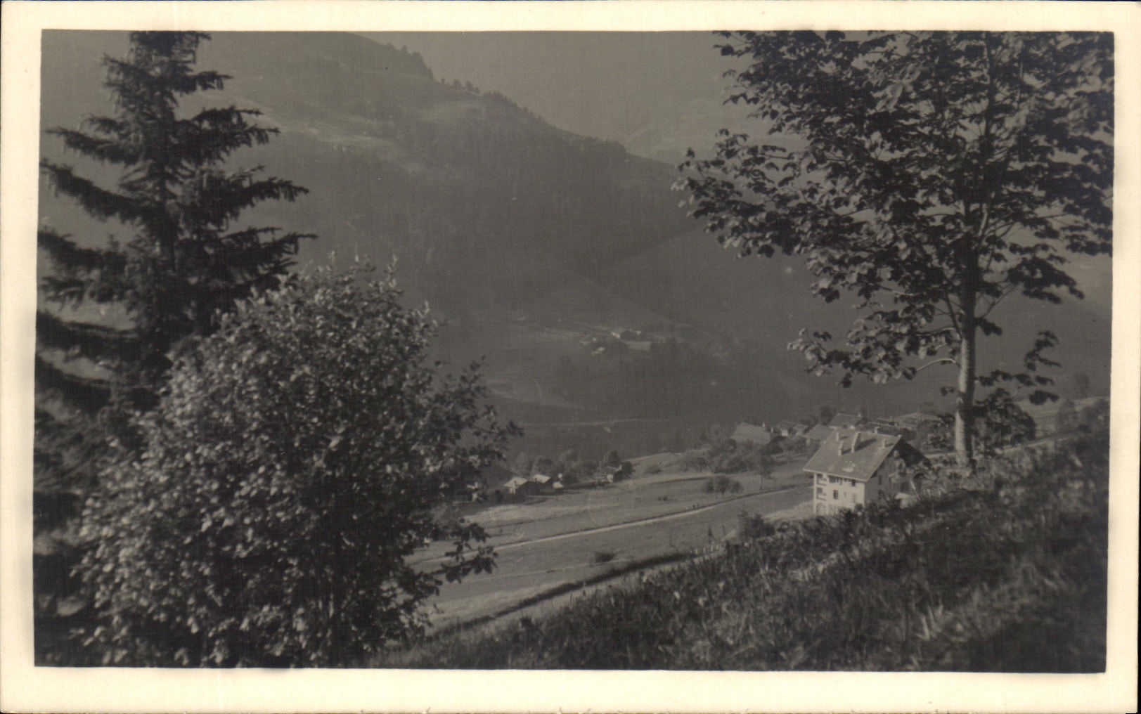 CARTE PHOTO Maison dans les montagnes
