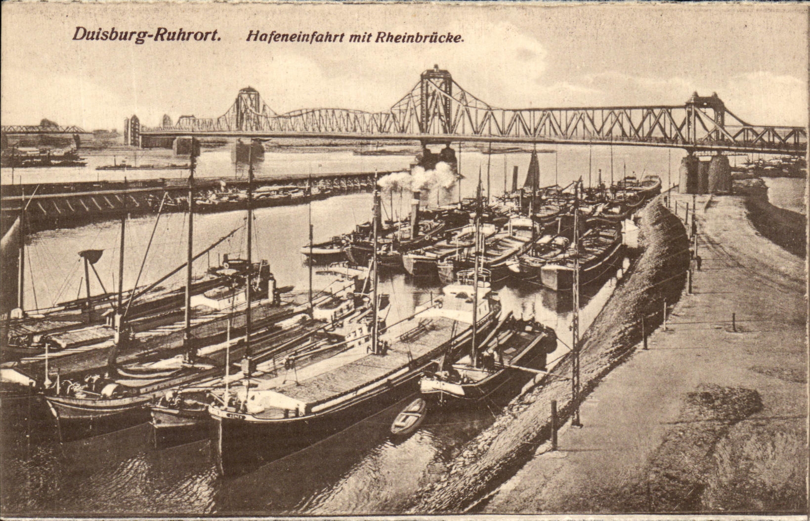 CPA Duisburg Ruhrot Hafeneinfahrt Mit Rheinbrucke Bateaux