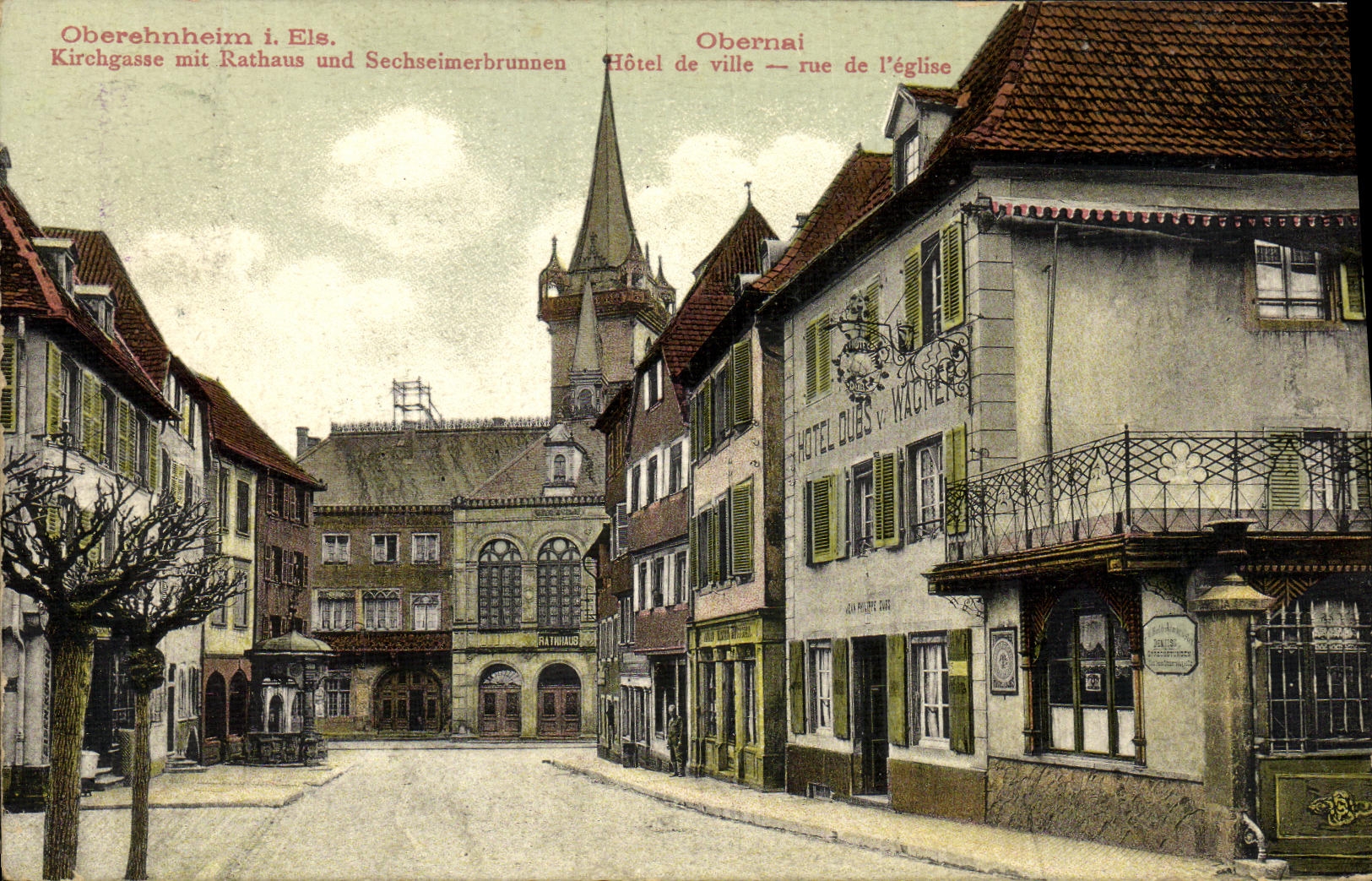 Oberehnheim i. Els. — Kirchgasse mit Rathaus und Sechseimerbrunnen — Verlag von F. Lorets Wwe.