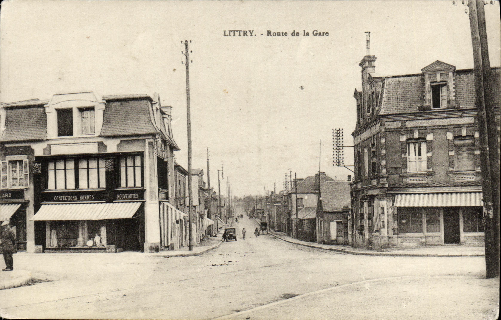 Littry - Route de la Gare — vue de la rue avec magasin de confections hommes