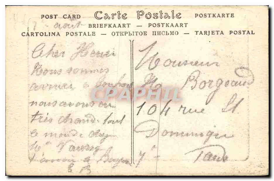 CPA Courseulles Sur Mer Les Jetees et le calvaire Bateau — Verso