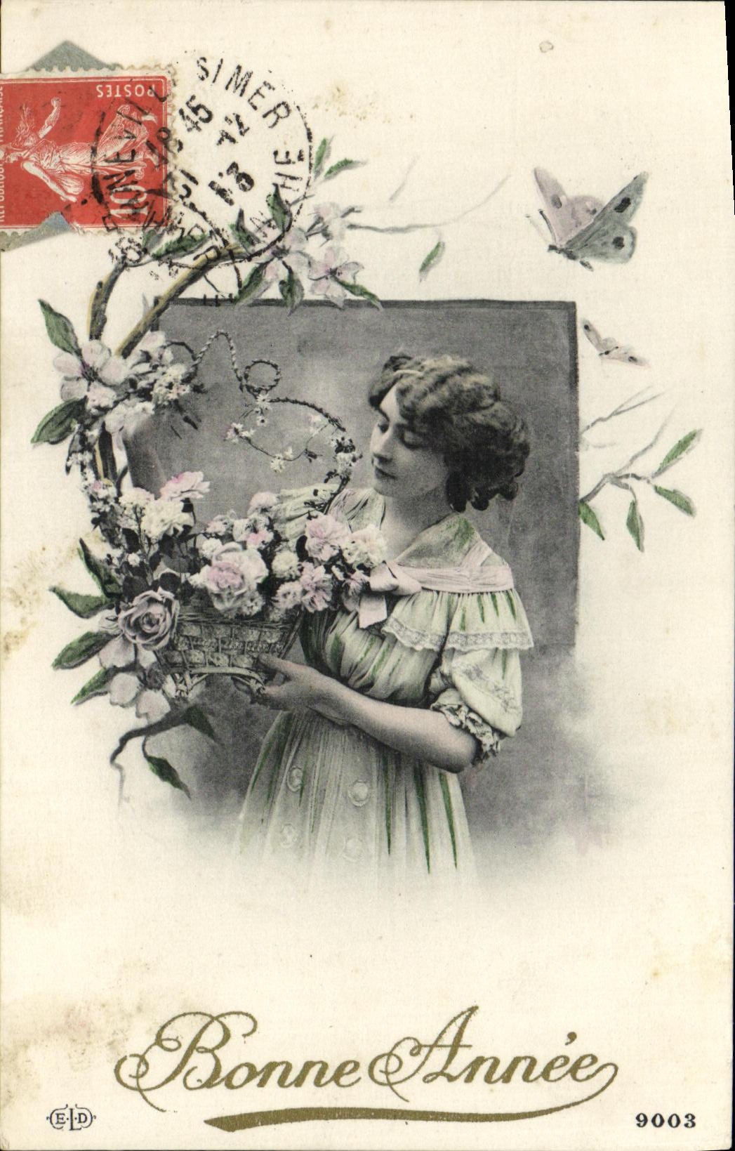 Femme tenant un panier de fleurs — Bonne Année 9003 — E.D.