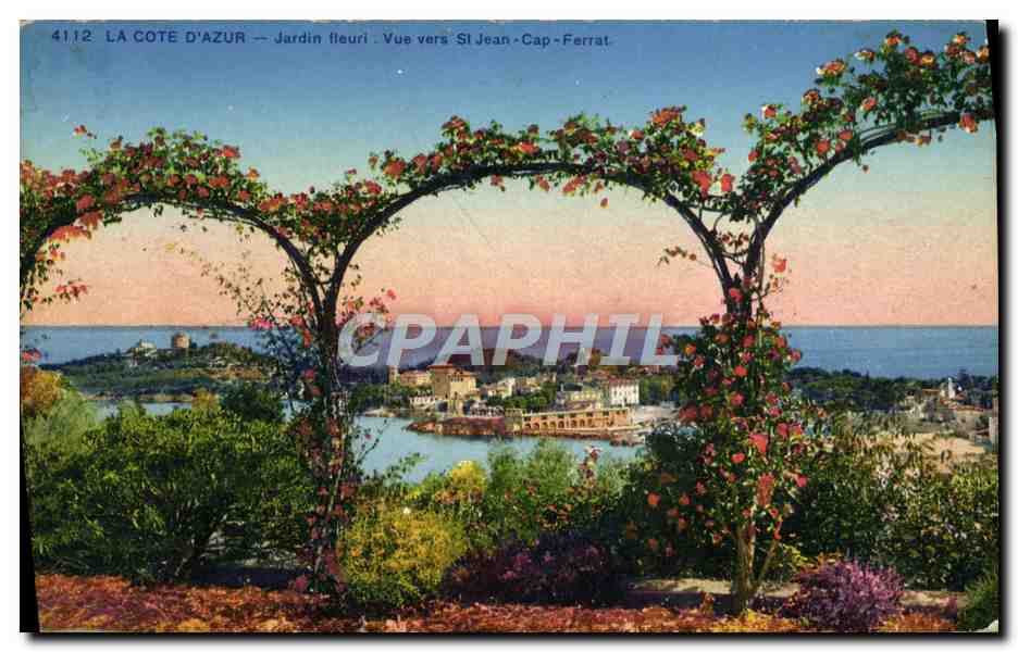 La Côte d'Azur — Jardin fleuri. Vue vers St Jean-Cap-Ferrat. — Photocromie A. Druet, Nice