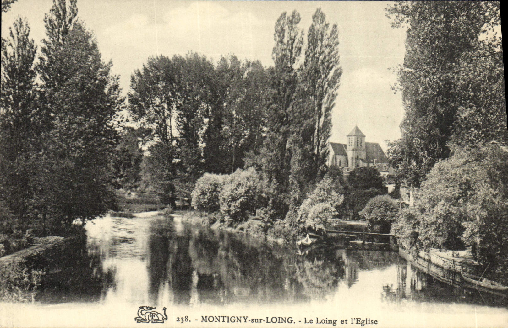 CPA Montigny Sur Loing Le Loing et l'Eglise