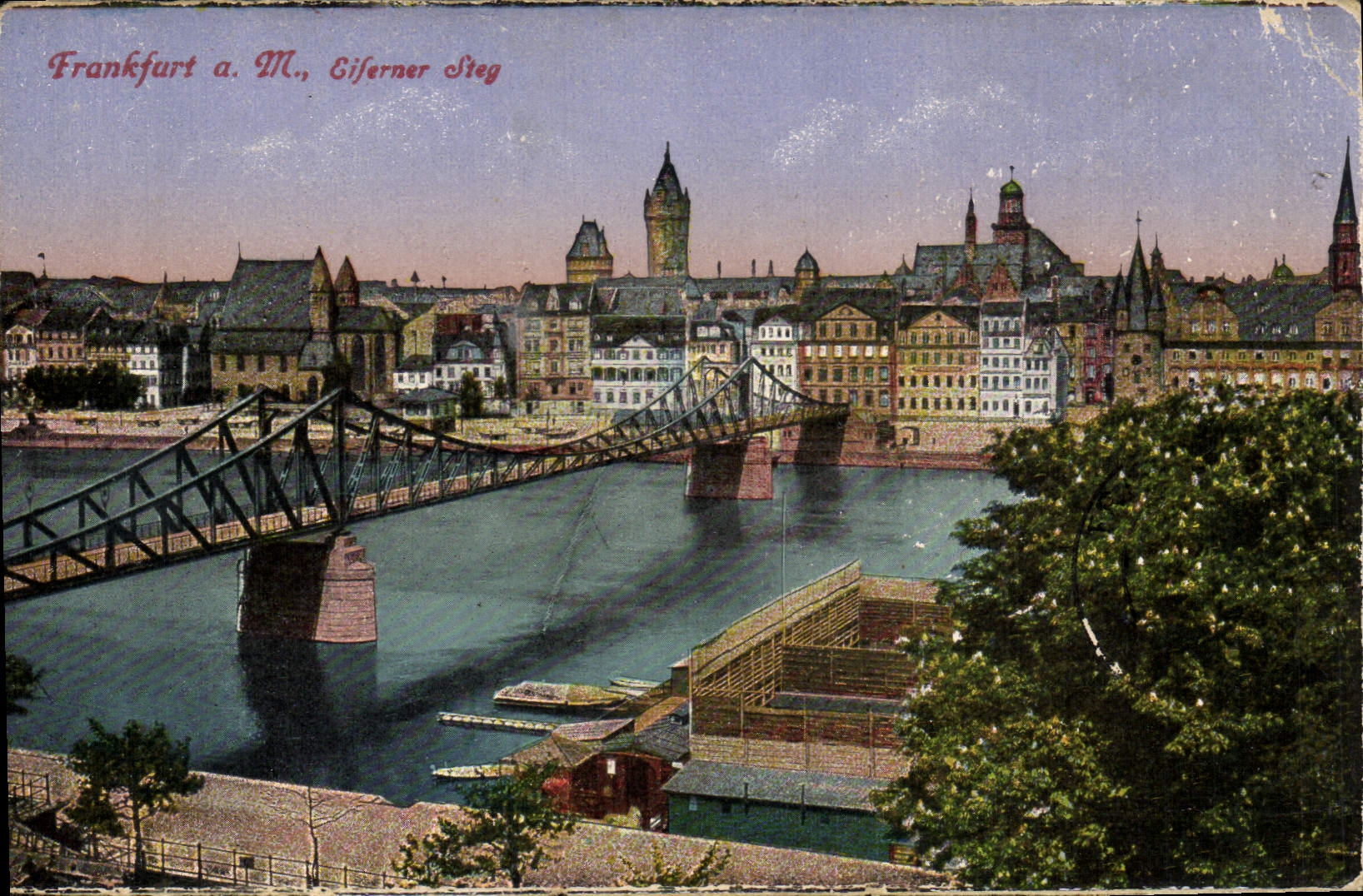 Frankfurt a. M., Eiserner Steg — view of the city and the metal bridge — Gerhard Blümlein & Co.