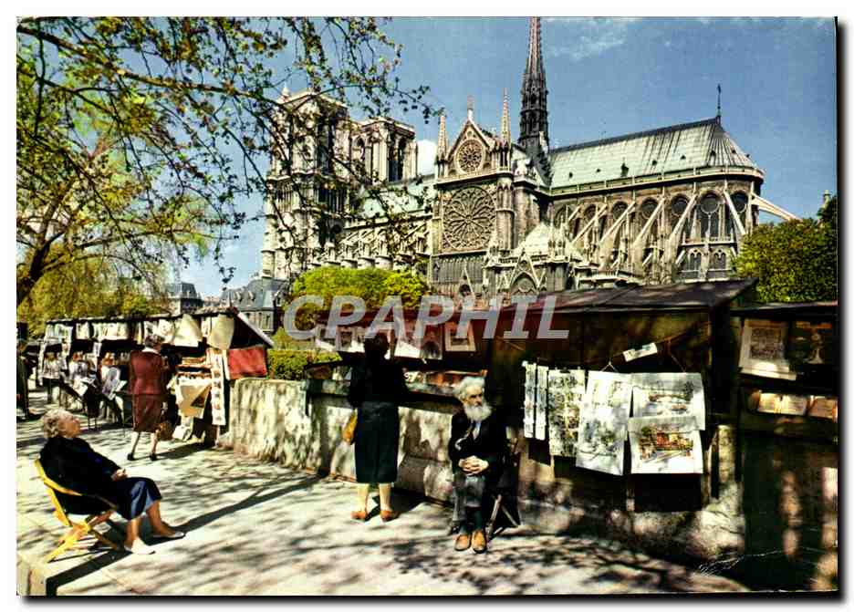 CPM Paris La Cathedrale Notre Dame Les bouquinistes