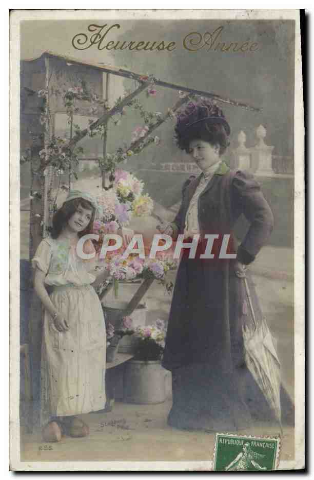 Femme et enfant devant un étal de fleurs — 'Heureuse Année' — éditeur Stübben & Fils