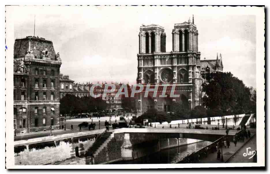 CPM Paris Notre Dame et le Petit bras de la Seine au pont double