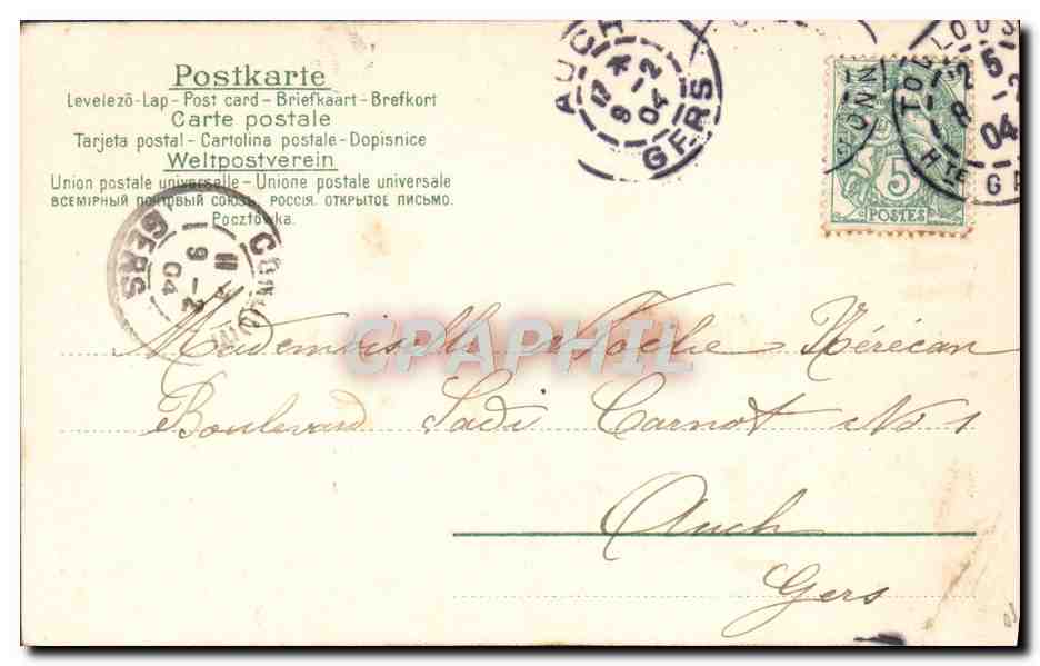 Joven mujer con sombrero de cintas — editor no identificado — fechada aproximadamente en 1904 — Reverso