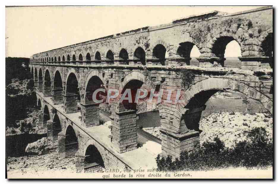 Le Pont du Gard — vue prise sur la rive droite du Gardon — ND. Phot.