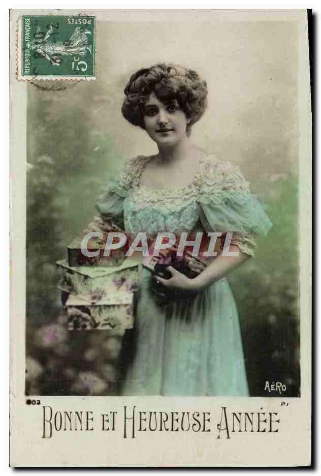 Jeune femme en robe bleue tenant des boîtes — Bonne et Heureuse Année — Aéro, n°003