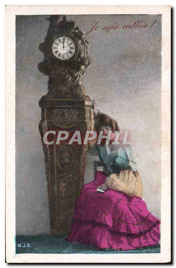 Femme à côté d'une horloge — 'Je suis ouvrière !' — M.J.S.