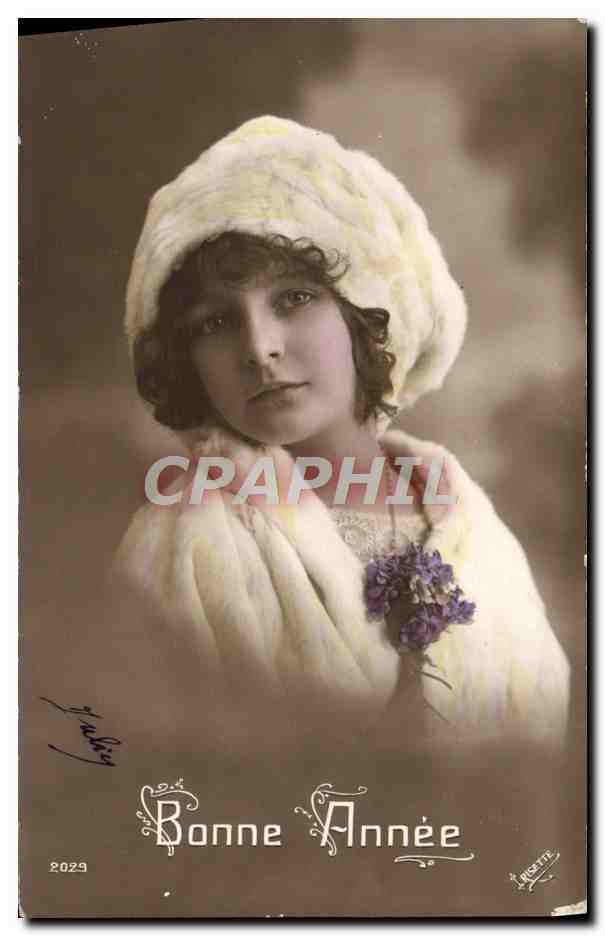 Joven mujer con sombrero y piel — Feliz Año 1929 — La MIGETTE, n°2029