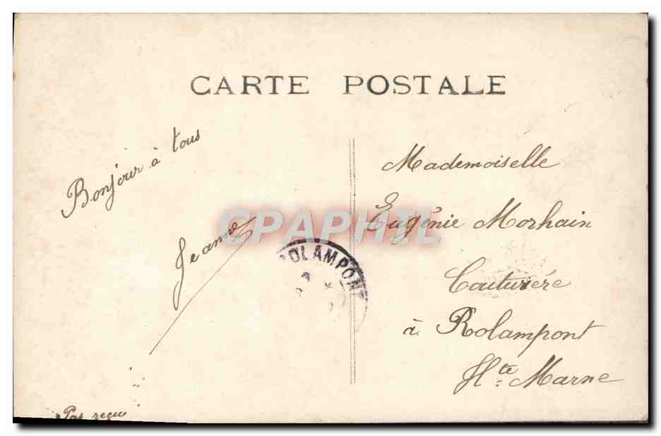 Jeune femme avec bouquet — 'Un baiser!' — éditeur inconnu, n° 404 — Verso