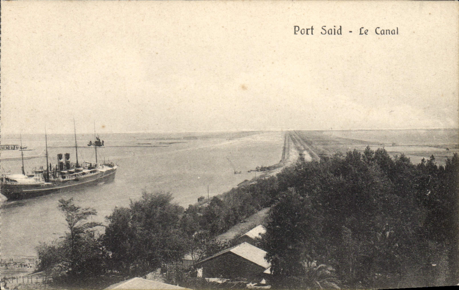 Port Said - Le Canal — vue du canal avec un navire à vapeur — The Cairo Postcard Trust, n° 36549