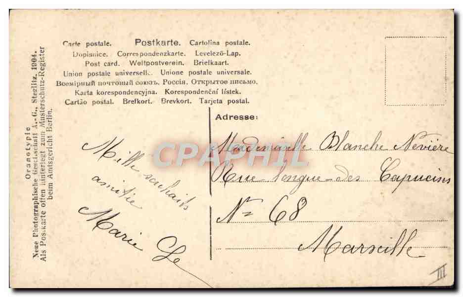 Mujer en un muelle — editor Neue Photographische Gesellschaft A.-G., Berlín — n.º 578/6 — Reverso