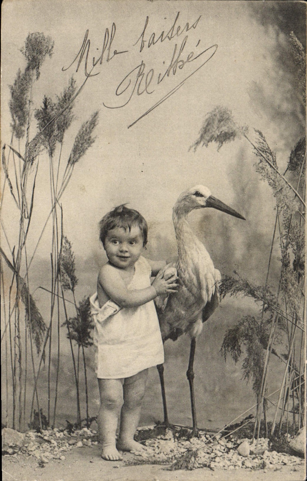 CPA Fantaisie Enfant Cigogne