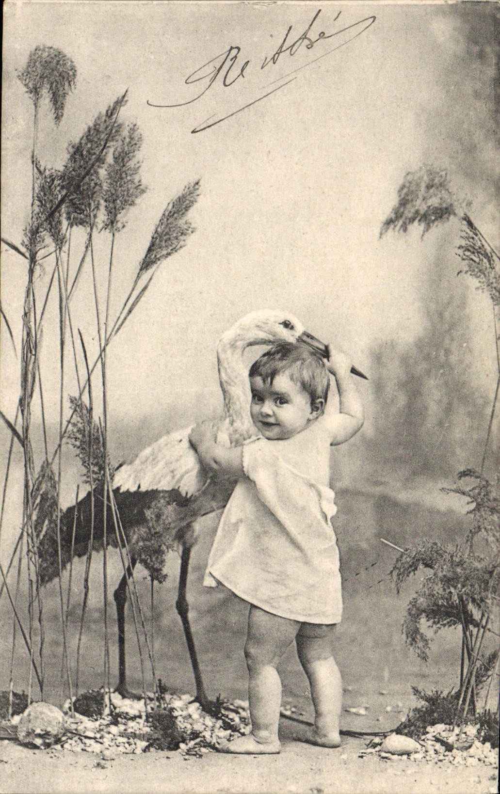 CPA Fantaisie Enfant Cigogne