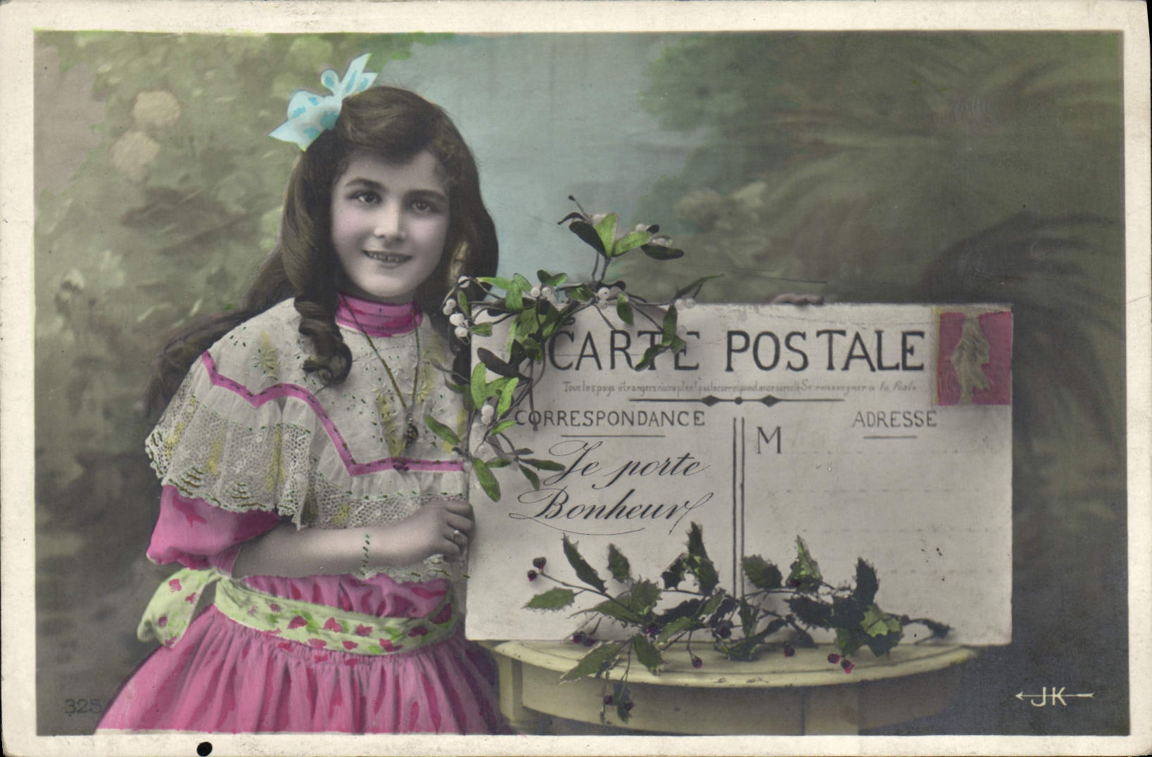 Niña en vestido rosa — con ramo de visco — editor JK, n°325 - Anverso