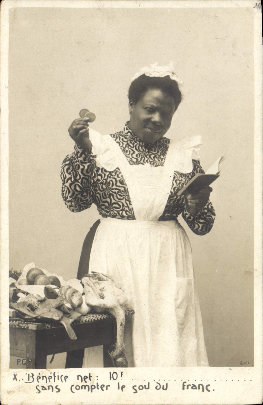 Femme noire en tablier — scène de marché avec fruits et livre — éditeur P.C.P. n° 10