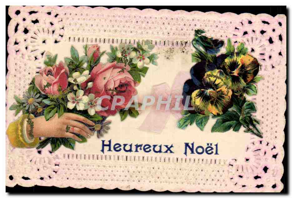 Fleurs et main — Heureux Noël — Carte postale de Noël
