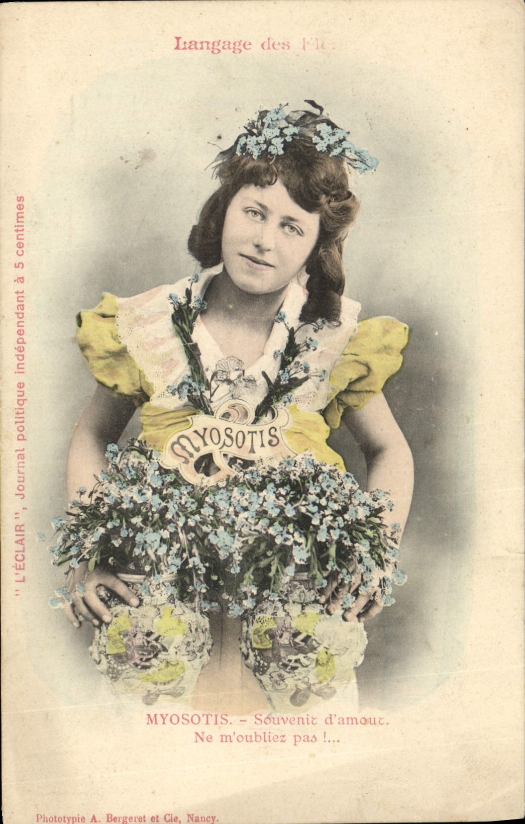 Femme avec bouquet de myosotis — publicité pour le journal 'L'ÉCLAIR' — Phototypie A. Bergeret et Cie, Nancy