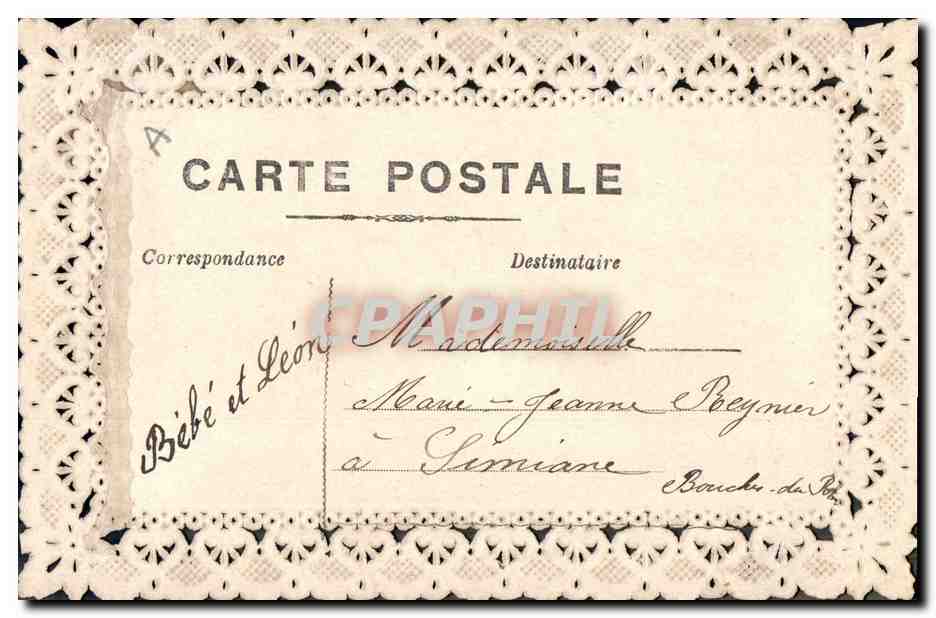 Enfant dans une fleur — carte postale ornée de dentelle — éditeur anonyme — Achterkant