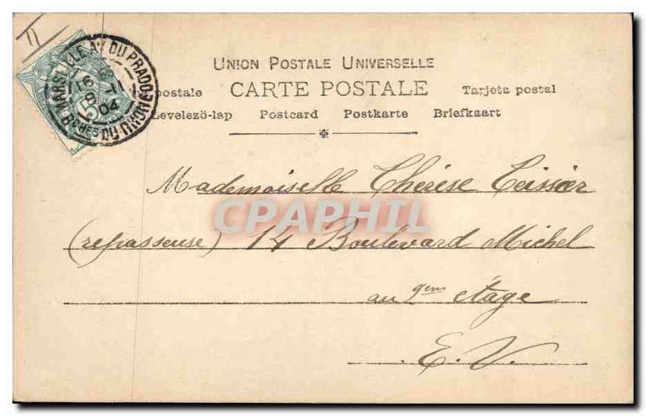 Femme en robe blanche tenant une faux — initiale décorative — Peutlinger Paris n° 8571/80 — Reverso