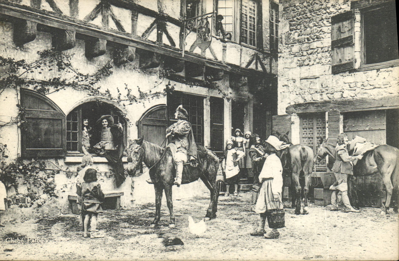 Los Tres Mosqueteros — escena de calle con caballeros y habitantes — editado por Pathé Consortium Cinéma