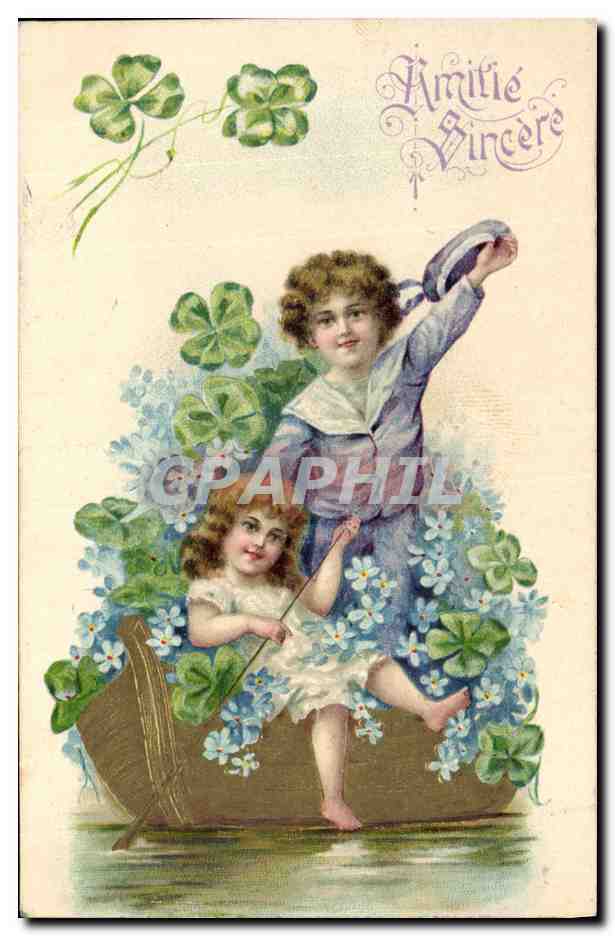 Deux enfants dans un bateau — trèfles et fleurs — éditeur non visible