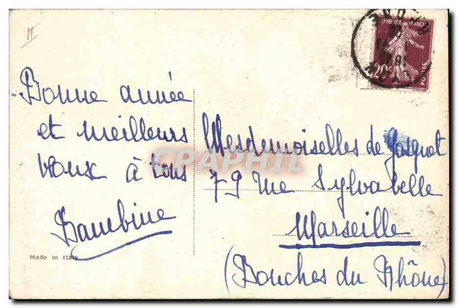 Lac avec montagne enneigée — bateau à voile rouge — éditeur inconnu — Verso
