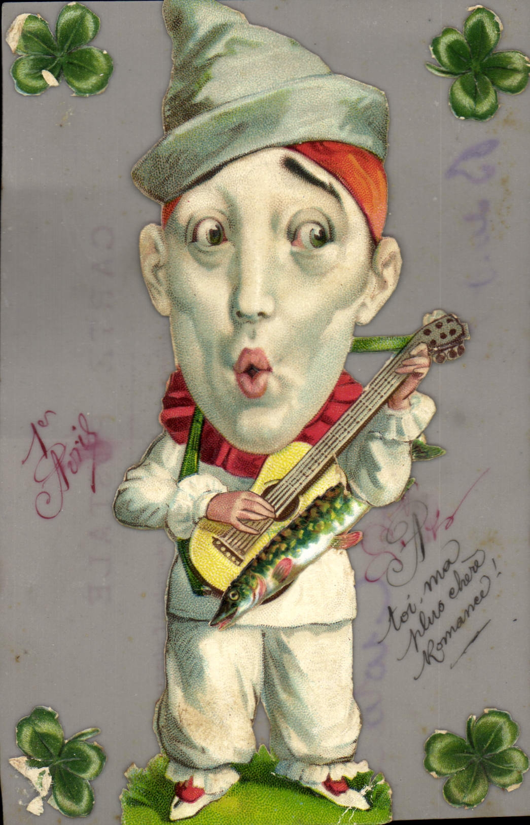 Gamin jouant de la guitare — avec poissons et trèfles — éditeur Carte Postale